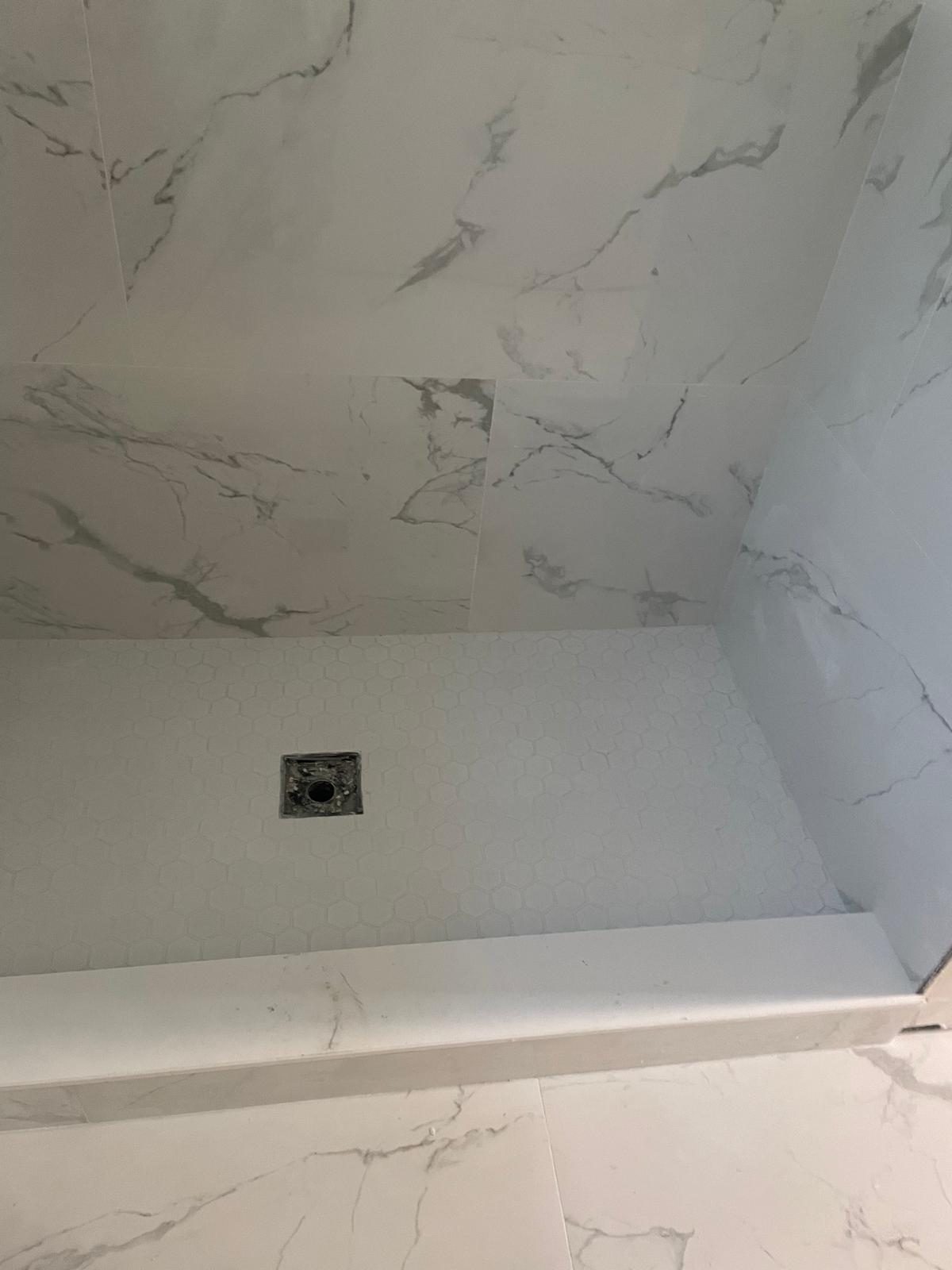 Large-format ceramic tile floor in a modern kitchen